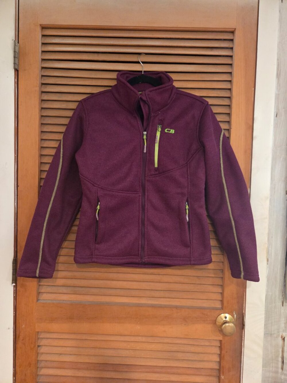 Magenta color jacket with chartreuse green trim
